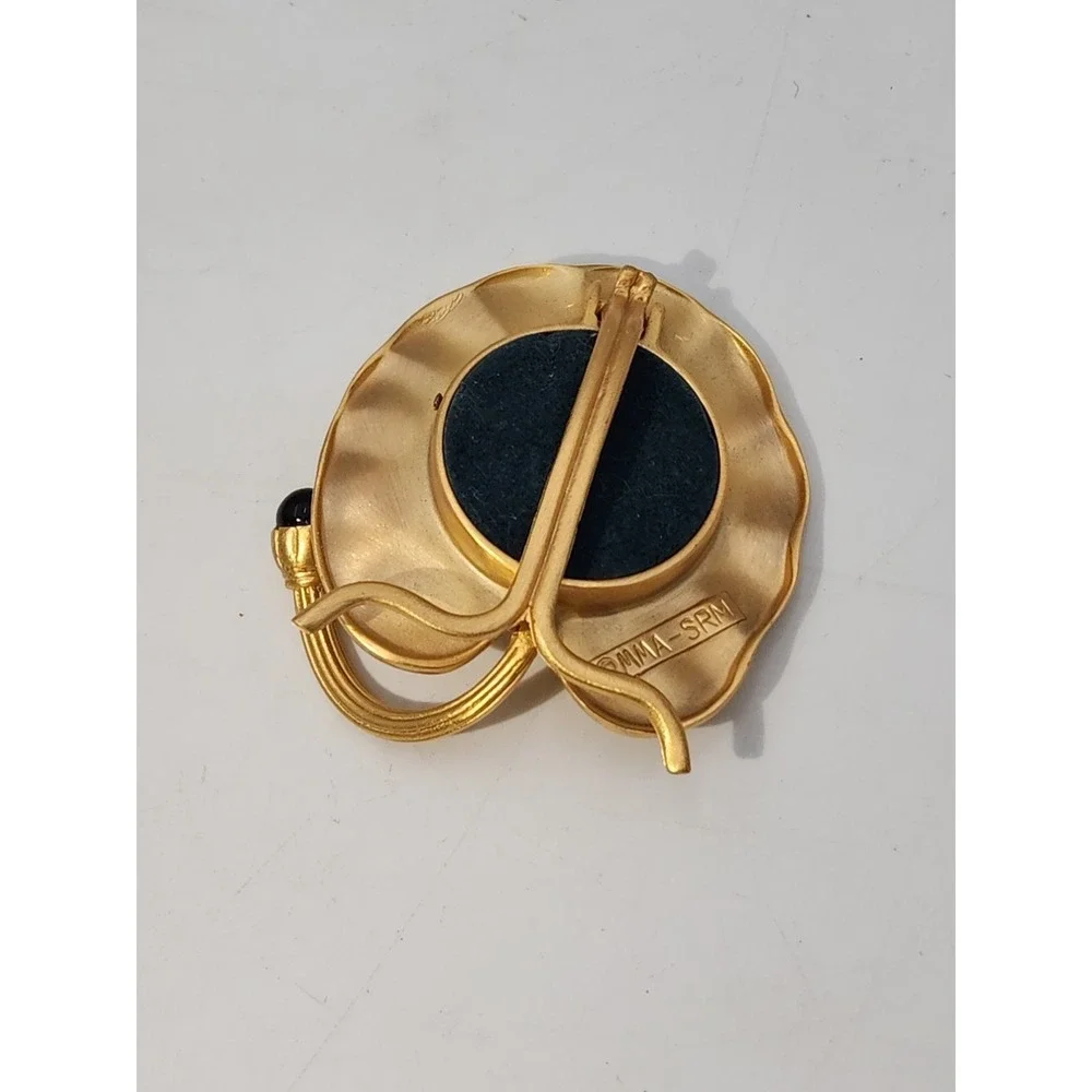 Vintage small Museum of Modern Art MMA-SRM lotus gold tone picture frame